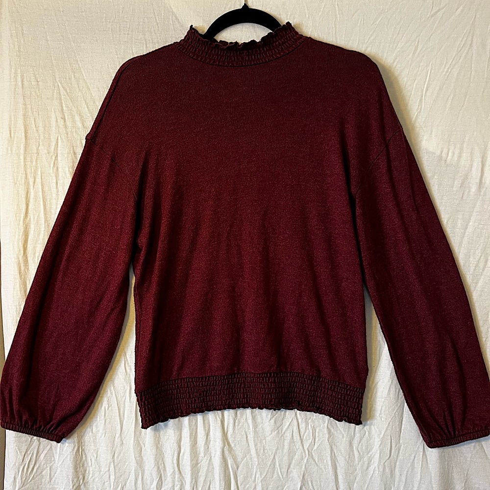 A new day women’s blouse with stretch sleeve cuffs and neck size small maroon